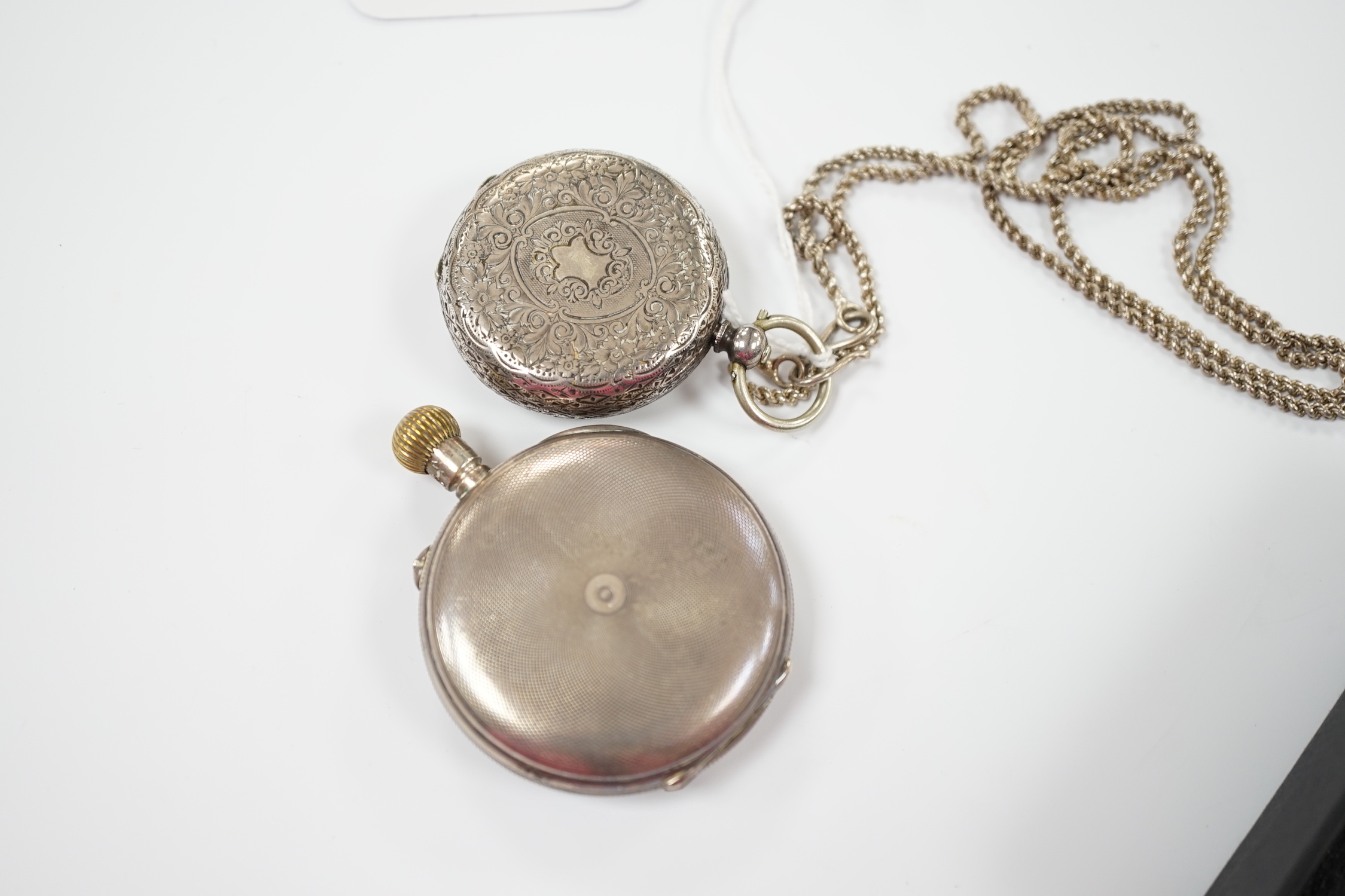 A 900 standard white metal hunter keyless pocket watch and a Swiss 933 standard white metal fob watch.